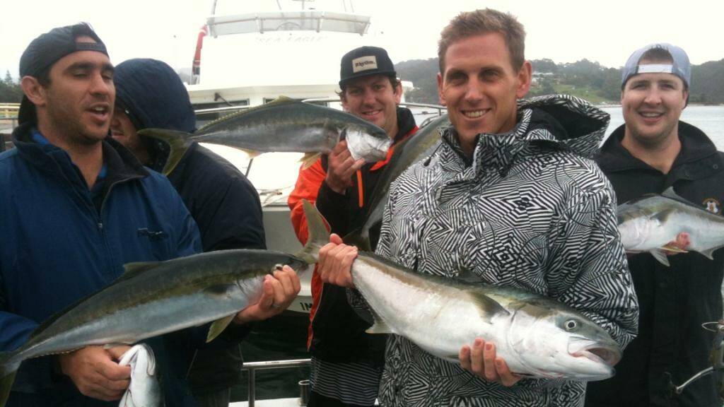 RAINY KINGS: The Lindsay Higgins bucks day boys with some of the nice kings caught on Saturday with Narooma Charters braving the wind and rain can provide dividends. John Stevens is pictured in foreground right with his 87cm king. 