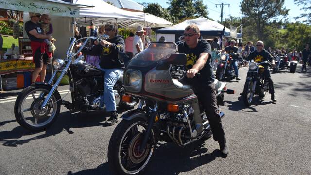 CRABS RIDER: Wayne Brooks leads the Bermagui chapter of the CRABS (Cancer Research Advocate Bikers) in the parade at the Tilba Festival on Easter Saturday.