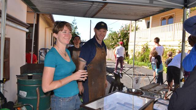 FORGE GUYS: Blacksmith Iain Hamilton and Sarah from Mother Mountain Forge at the Tilba Festival on Easter Saturday.