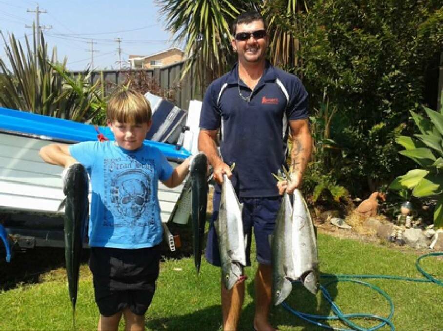 KINGIES ON THE BITE: Jake Mikolic and his dad Mitch hit the water on Sunday and caught some lovely Kingies. 