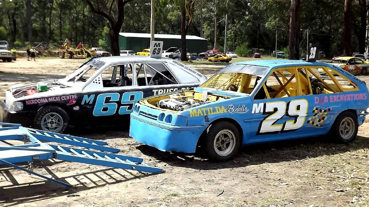 MORUYA SPEEDWAY: Kath and Wayne Healey’s two Ford Lasers in the pits Kath’s car is #29 and Wayne's car is #69. 