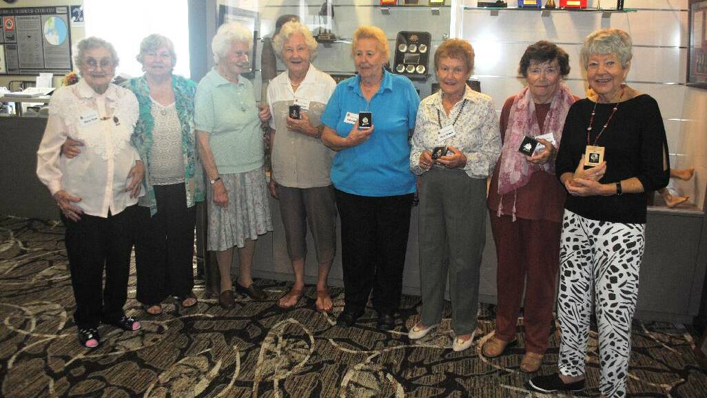 RSL MORNING TEA: The Narooma RSL Sub-branch holds a morning tea every Thursday in the Montague Room at Club Narooma from 10am. Last Thursday, they presented Army, Navy and Air Force Female Relative Badges to the wives of men that had fought in WWII. Eight women in all received the pin from left Marie Ryan, Joan McNally, Myfanwy Deadman, Edna Read, Pat Powell, Mary Brown, Jean Hartstorff and Valerie Tippins.