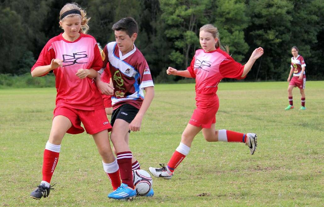 GREAT DEFENCE: Anya Shatrov and Elise Dixon worked efficiently in defence during the U13s Redbacks game against Clyde on the weekend.