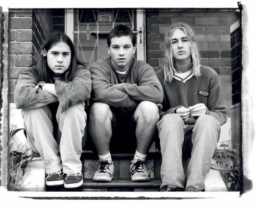 This early portrait of Ben Gillies, Chris Joannou and Daniel Johns as Silverchair features on the cover of Love & Pain.