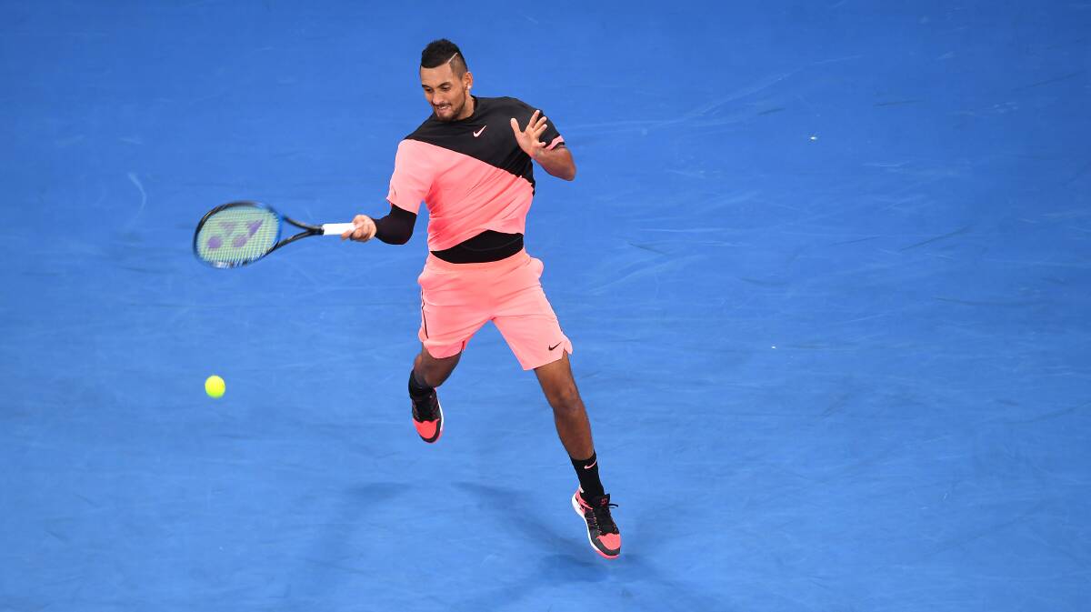 Nick Kyrgios of Australia is seen in action against Rogerio Dutra Silva during round one of the Australian Open tennis tournament in Melbourne, Monday, January 15, 2018. (AAP Image/Julian Smith)