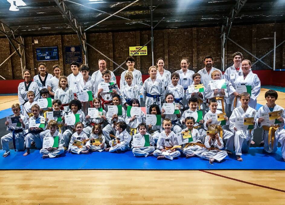 PROUD MOMENT: The group at Ilyo Taekwondo after their grading.