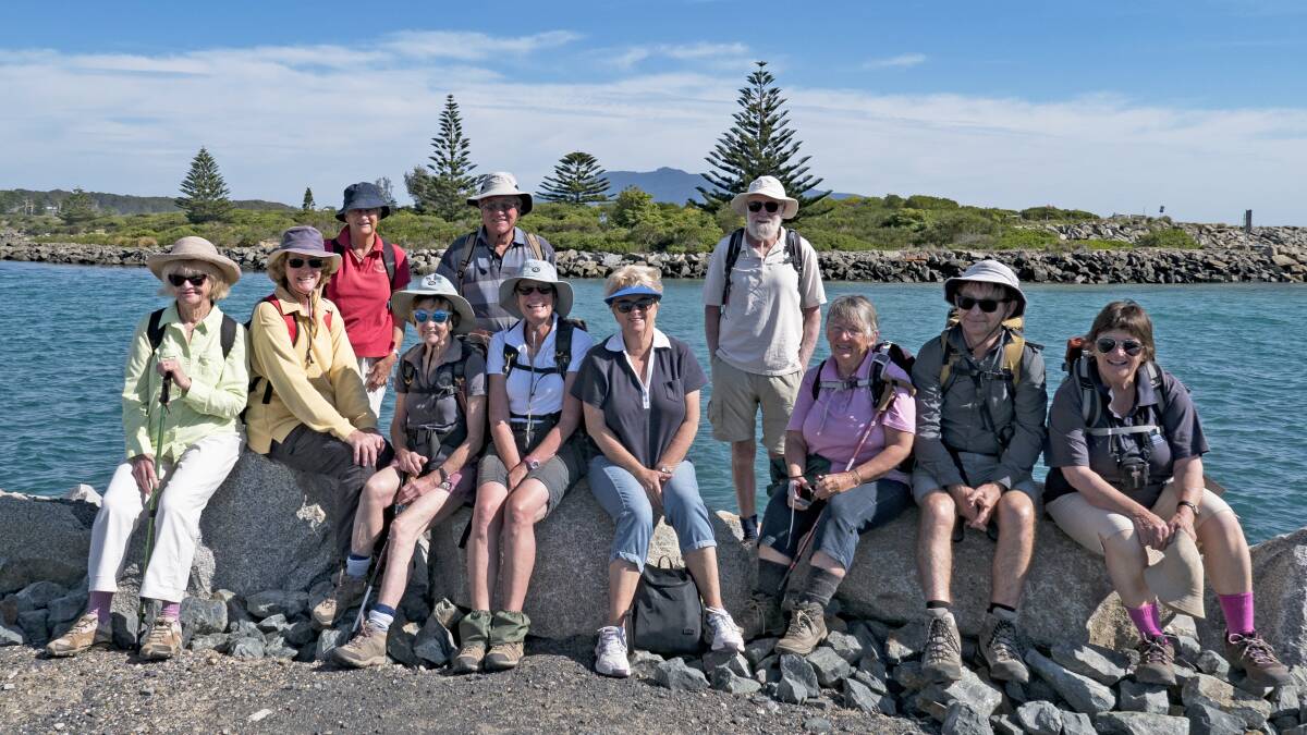 Beautiful Bermagui:   Dalmeny Narooma Bushwalkers take a breather during their journey around Bermagui's headlands and waterfront.