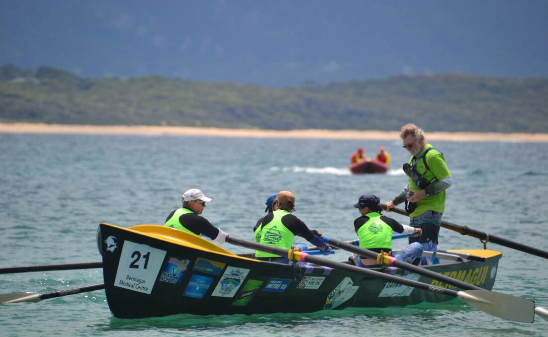 The Darwin crew pull into Bermagui's Horseshoe Bay Beach on day four of the George Bass Marathon.