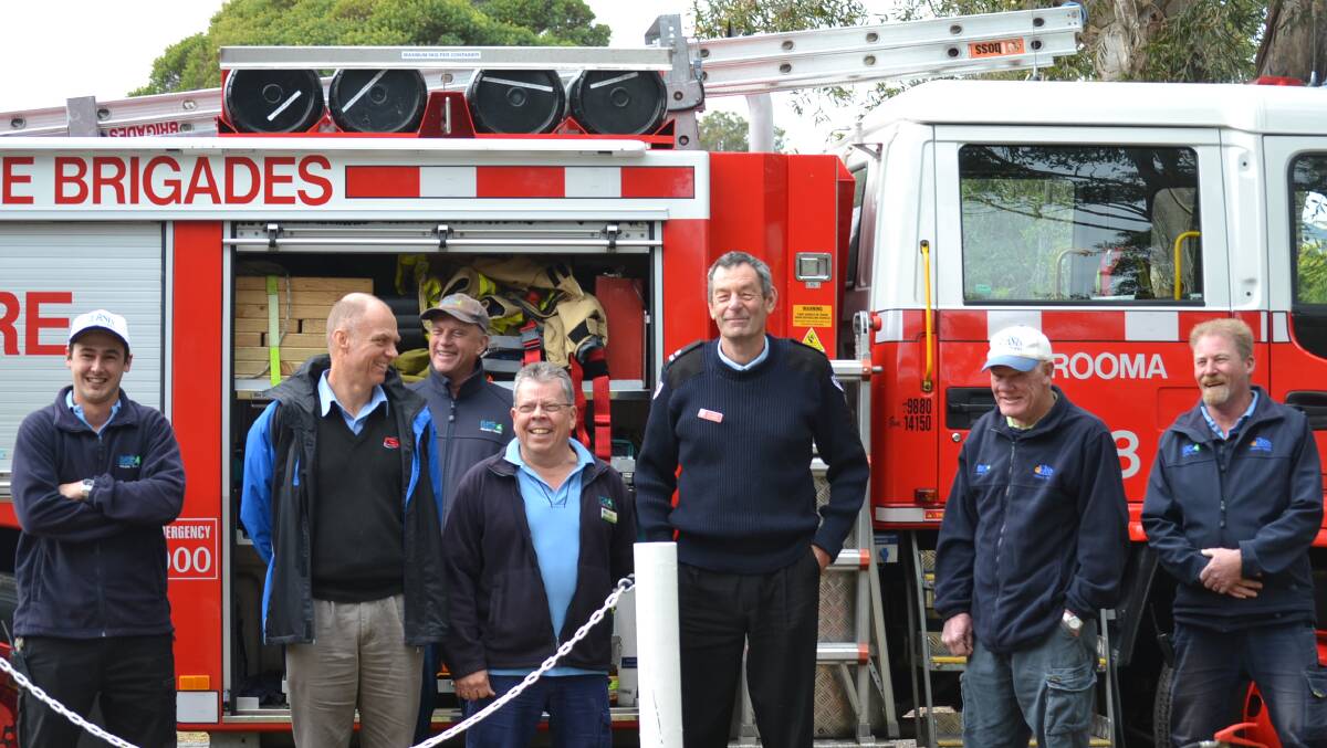 Fire and Rescue duty commander Alan Gerrard (third from right) with staff members of Big4 East's Caravan Park.