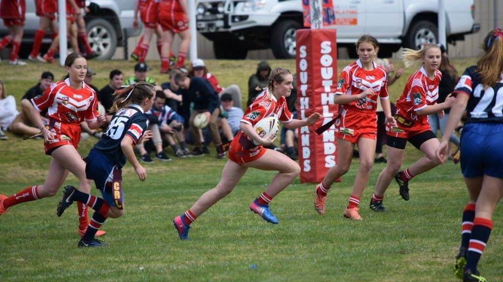DOMINANT: The Devils' league tag girls shut out the Bega Roosters 20-0 to bring home the premiership. Photo: Shay Carr