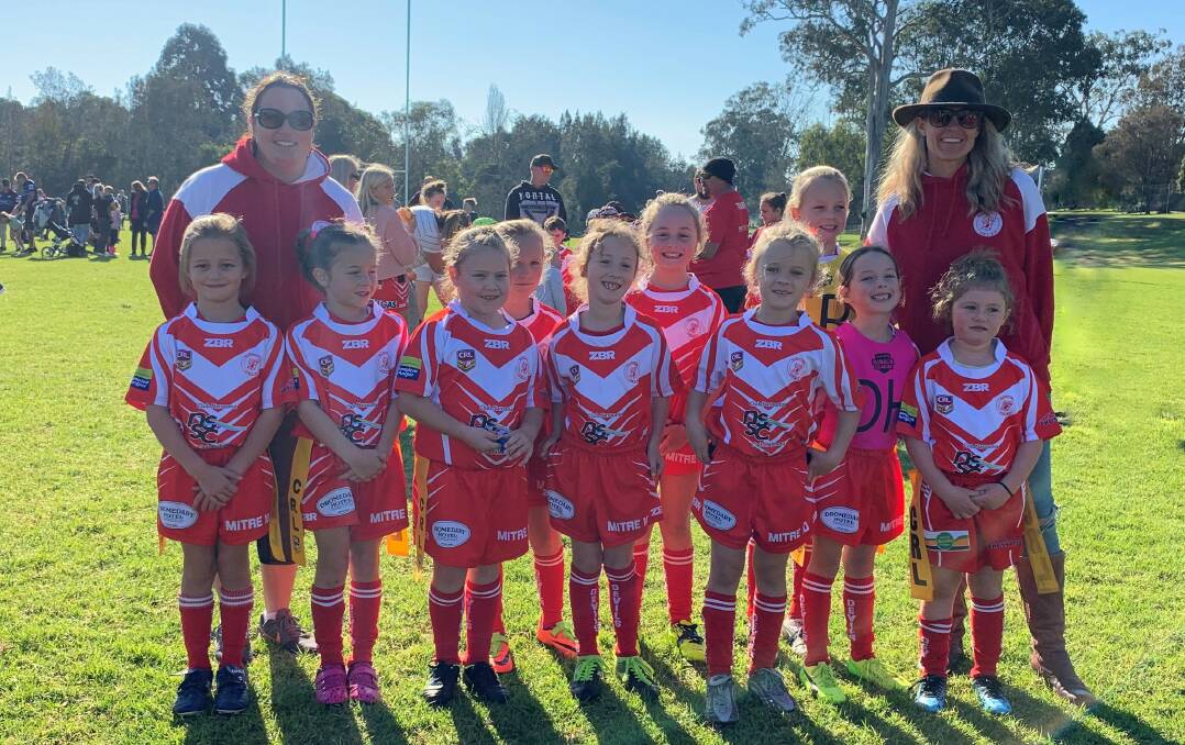 The under 9s league-tag girls with coaches Kate and Narelle.