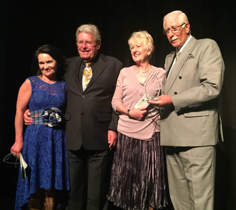 WINNERS: Jim Madden, Heulwen Lane and Darcy Nelson celebrate the Country TAB Race Club of the Year Award with a board member of Racing NSW. Photo: John Mobbs