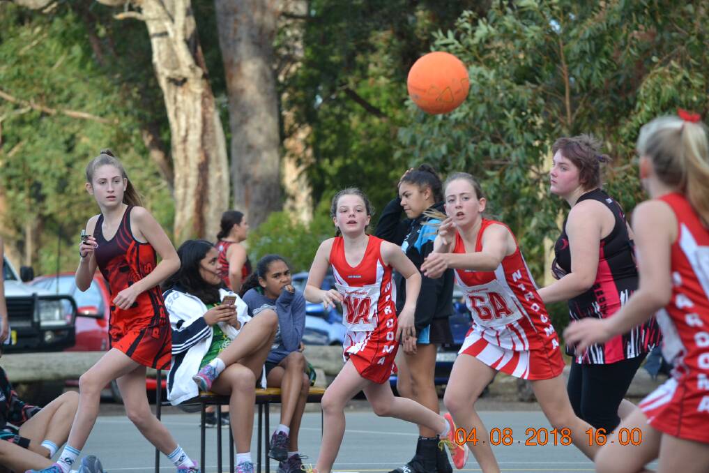 Lani and Grace in action for the Narooma Comets.