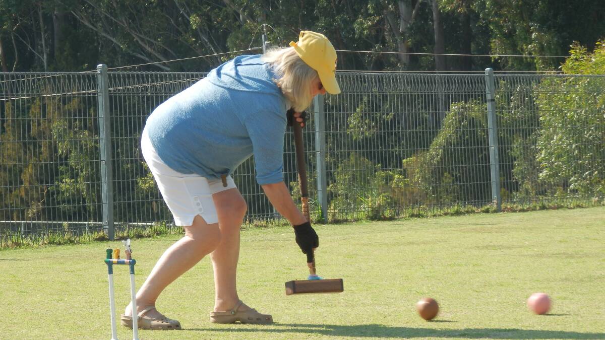 PLAY ON: Pauline Wilcock takes part in the Croquet Association match on Sunday.