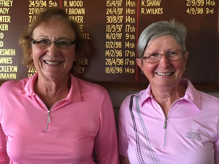 Narooma Ladies: Division 1 winner Jan Boxsell (right) and Division 2 winner Di Williamson at the club's Breast Cancer Research fund-raising day.
