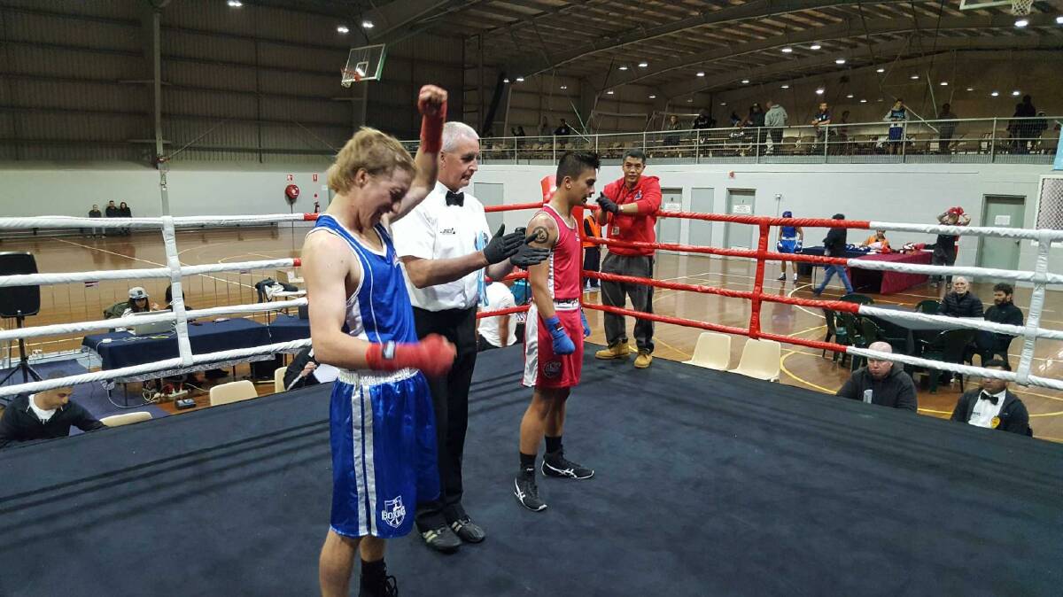 WINNER: Jake 'The Snake' Jamieson defeated Christian Millares on Saturday at the Illawarra Sports Stadium to claim the 64-Kilogram Elite Male NSW Boxing Title.