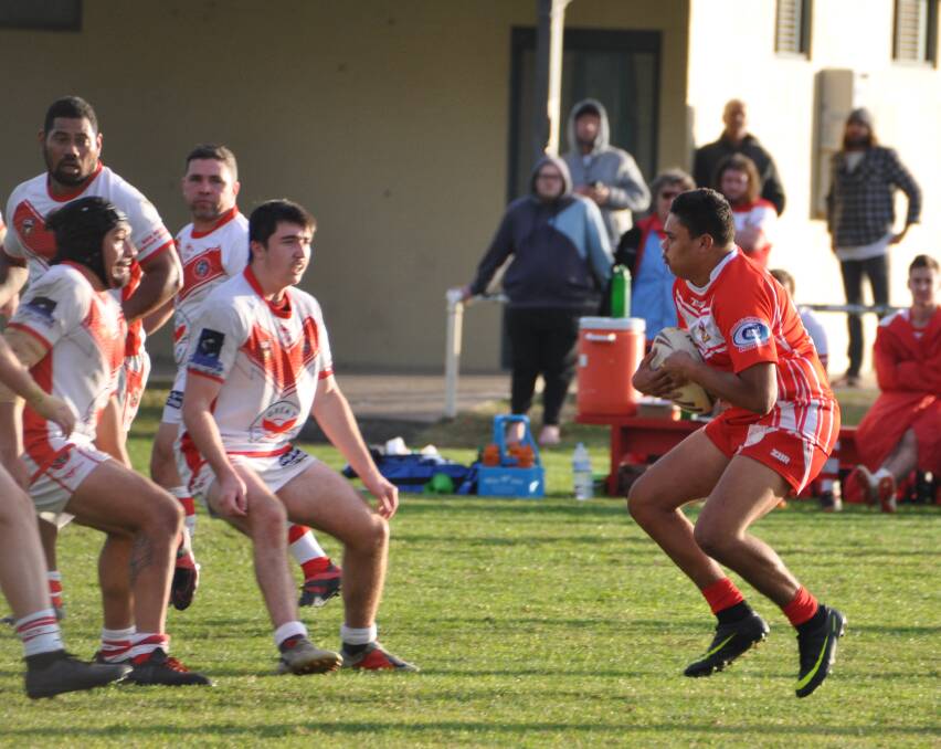 OVERWHELMING ODDS: Narooma and Eden pictured playing in June. The Devils showed amazing resilience last weekend before losing so many players, full-time was called early.