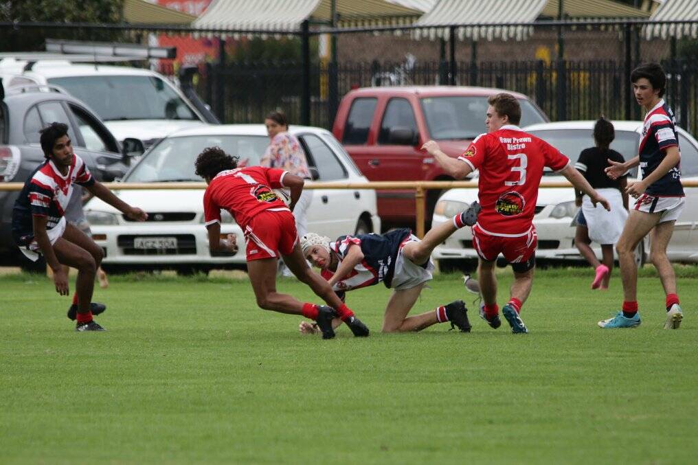 DOUBLE: Narooma fullback Matt Parsons scored two tries in the Narooma Devils under 18s 30-6 win over the Bega Roosters. Photo: Peter Sheales Footy Fotos.