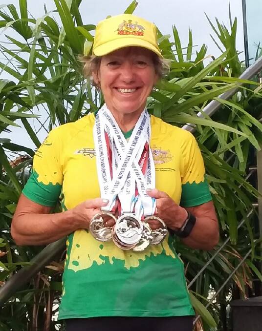 Therese Holgate with the swag of medals she won at the 2019 World Dragon Boat Championships in Pattaya, Thailand.