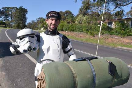 MAN BEHIND THE MASK: Young Jacob French, 21, from Busselton, WA had a hard time getting through the district not only but because of the hilly terrain but because of all the attention.