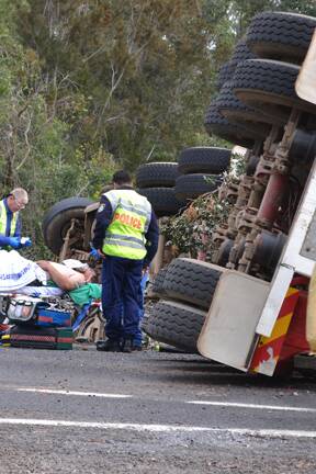 TRUCK ROLL-OVER: The truck driver and the other cars he narrowly avoided where fortunate not to be killed after the accident south of Narooma.
