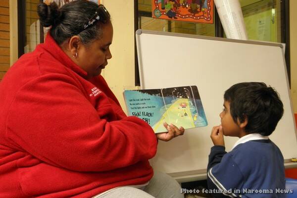 STORY BOOK: Tanya Parsons reads to her son Bradley at the Little Yuin Book Buzz day.