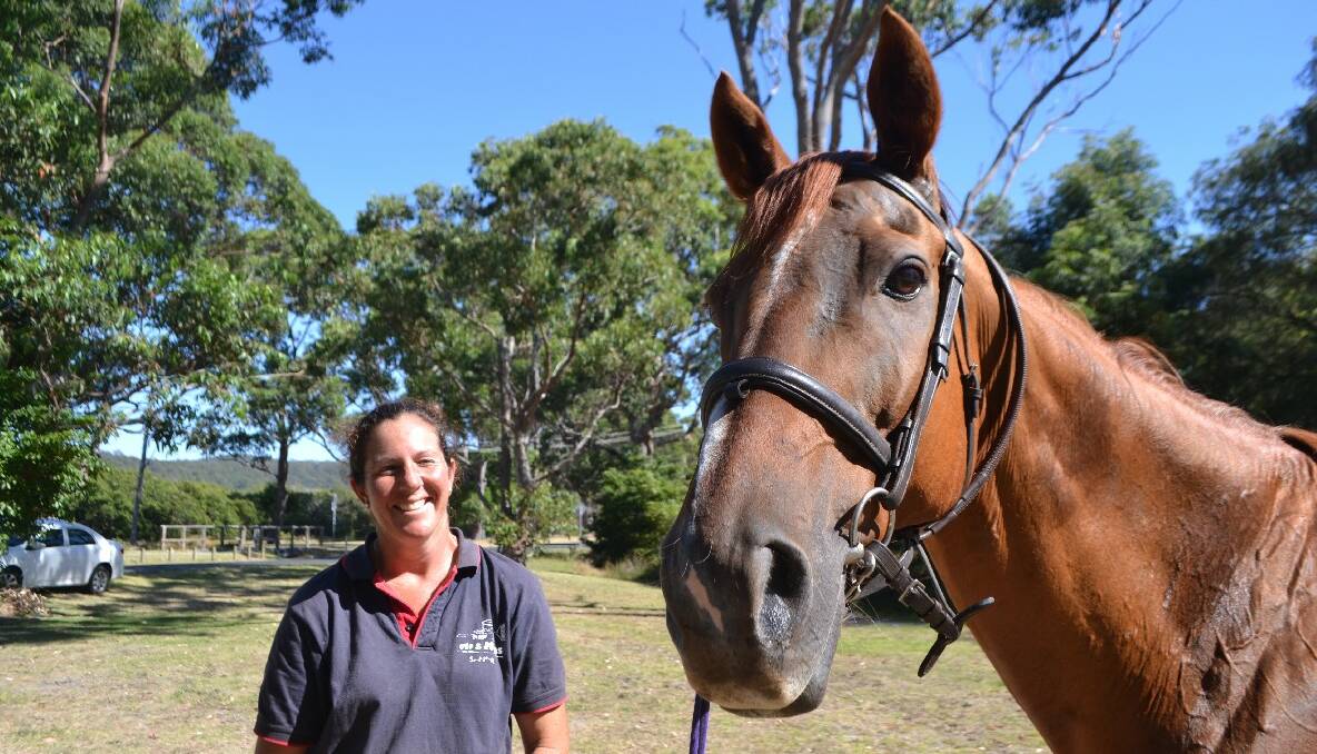 SHOW JUMPER: Narooma show jumper Sandra Kenny and her horse Alando, better known as “Ed”, who is still recovering from injury.