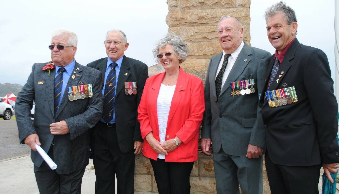 CONTIBUTORS: Narooma RSL sub branch president Paul Naylor, Narooma RLS sub-branch treasurers Jon King, Narooma Quota president Suzanne Pryke, Jim Pollock and Trevor Bennett at the Remembrance Day WWII plaque dedication service at the Narooma cenotaph. 