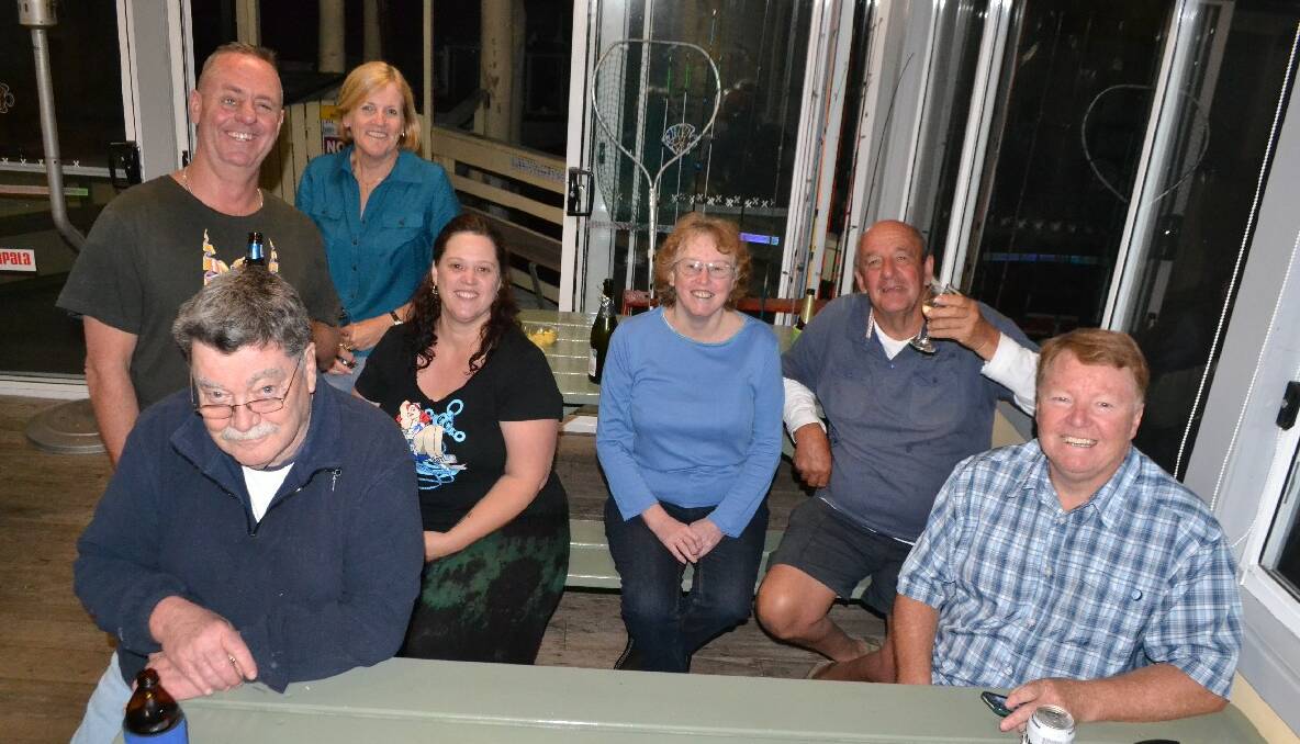CLUB CREW: Enjoying the social scene on every Friday evening at the Narooma Sport and Game Fishing Club were Mick Roberts and Sue Waldock; (front) Terry Vincent, Bec Fenton, Christine Vincent, Peter Kane and Les Waldock. 