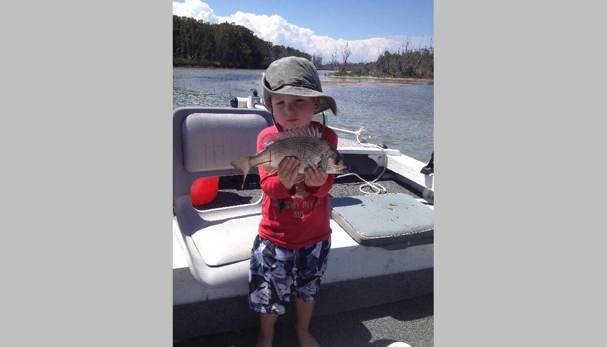 MAC’S BREAM: Local youngster Mac Lavis with a bream caught and landed himself last Sunday in Mummaga Lake at Dalmeny.  