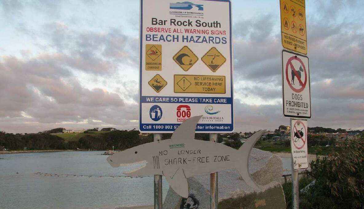 FUNNY SIGN: Keeping the Bar Beach shark net swimming enclosure at Narooma maintained is a constant battle for Eurobodalla Shire Council and here someone put up a humorous sign after the net sagged and gaps appeared in 2010.  