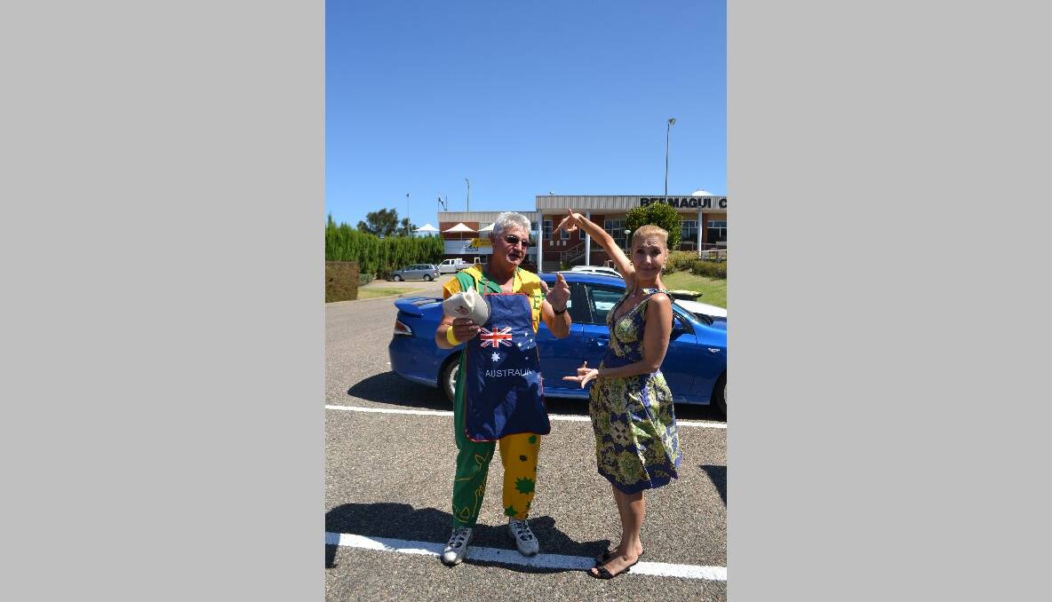 HAMMING IT UP: Catriona Rowntree checks out Bermagui Country Club golfer Wayne Burke who took a break from the club’s Australia Day barbecue to show her his Aussie onesie. 