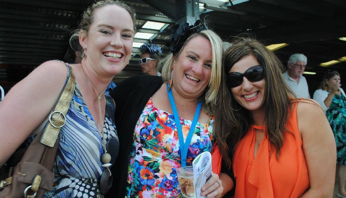 CHEEKY CHICS: Leanne Constable of Narooma, Vanessa Howard of Moruya and Shelley Davis of Batemans Bay having a jolly good time at the cup. 