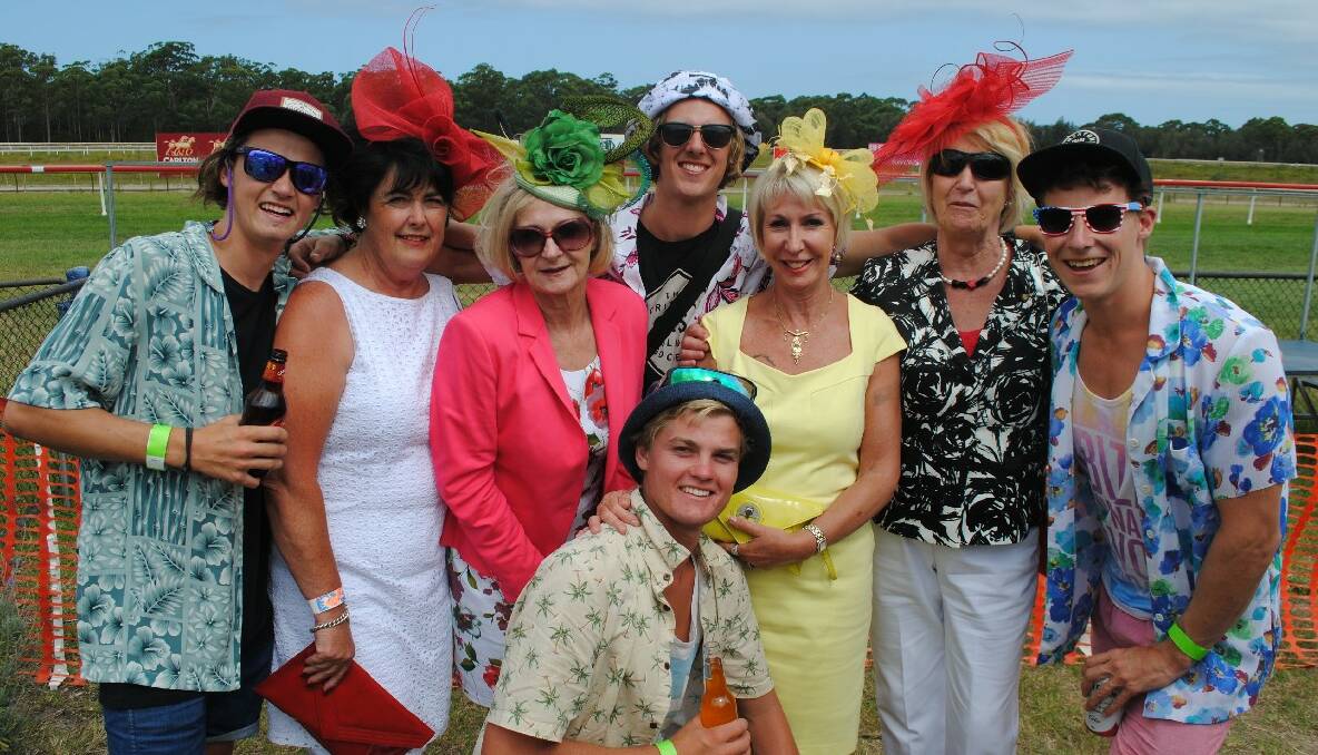 RACE GOERS: The lads Declan Milburn, Callum Milburn, Jack Bridges and Nathan Pell of Melbourne with Women in Racing Phillipa Doble, Rosemary Harrison, Valerie Sellers and Sue King. 