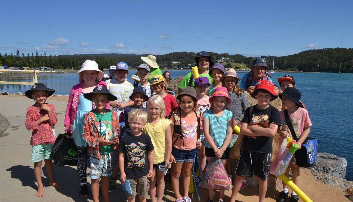 The kids from the Eurobodalla OOSH holiday care program had fun down at the wharf.