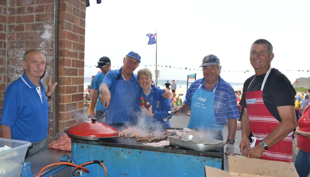 AUSSIE BARBECUE: Manning the Australia Day barbecue last year at the surf club, where all the Narooma activities will take place this year, are Jock Rowland, George Hogge, Ros Barr, John Glover and Unto Holopainen. 