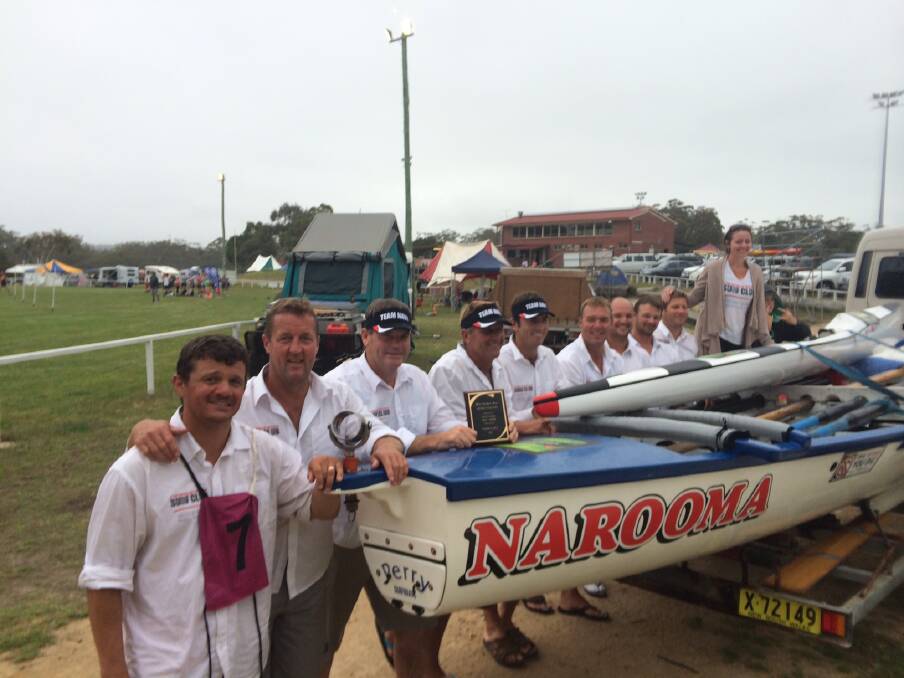 Team Narooma and its Day 6 trophy at the oval at Pambula.