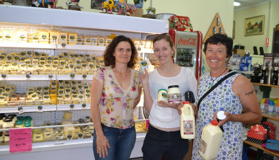 MILK FANS: ABC Tilba Real Milk founder Erica Dibden chats with huge fans of her milk – Annie Ray from Bermagui and her daughter Asha Ray visiting from Sydney, who were picking up more supplies to make their own yoghurt.  