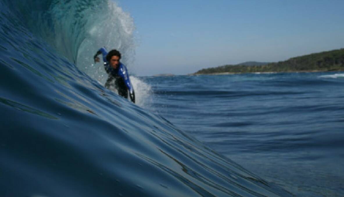 SURFING SAFARI: Benjamin surfs as he goes...