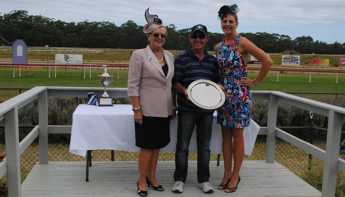 PLATE UP: Sponsors of the Narooma Town Plate Lynches Hotel’s Jan Carter, with race winner Terry Robinson and Victoria Carter. 