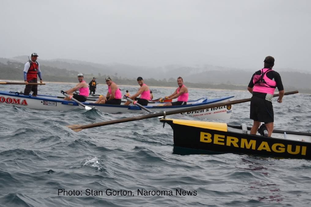 GOOD LUCK: Bermagui sweep Rob Shaw and Narooma sweep Brendan Constable wish each other good luck at the start of the George Bass Surfboat Marathon at Tathra. Photo: Stan Gorton, Narooma News