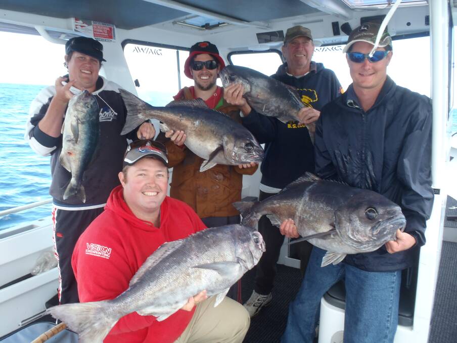BLUE EYE: The Wilson family crew on board Charter Fish Narooma with a brace of blue eye...