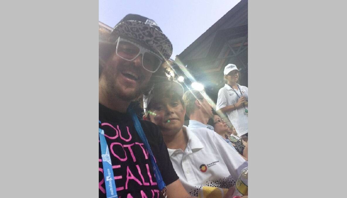  RED HOT: On an afternoon off, AJ sat with Red Foo and watched Gael Monfils at the Australian Open. 