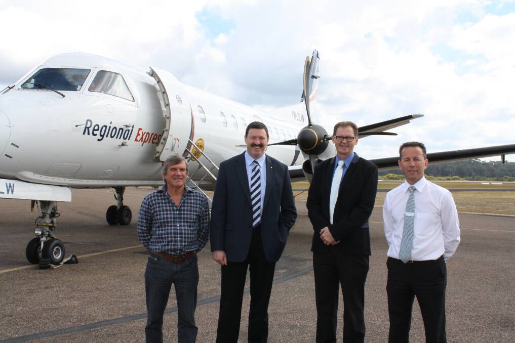 AIRPORT UPGRADE: Those present for the Moruya airport announcement were Eurobodalla councillor Rob Pollock representing Regional Development Australia Far South Coast, Federal Member Dr Mike Kelly, Eurobodalla mayor Lindsay Brown and tourism and economic development manager Andrew Greenway. 