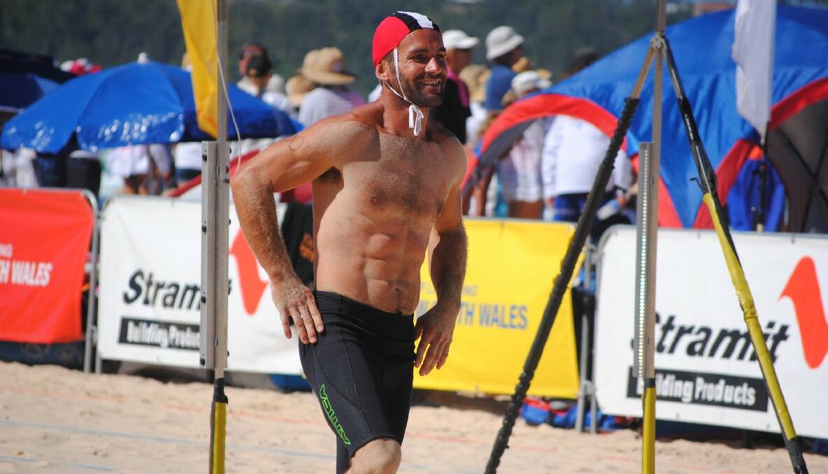 FLAG RUNNER: Justin Bennett won gold in the 30-39 Male Beach Flags competition. 