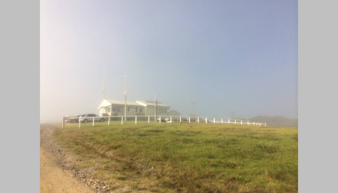 FOG SHROUDED: The Marine Rescue Narooma headquarters on the headland was shrouded in fog early on Thursday morning.