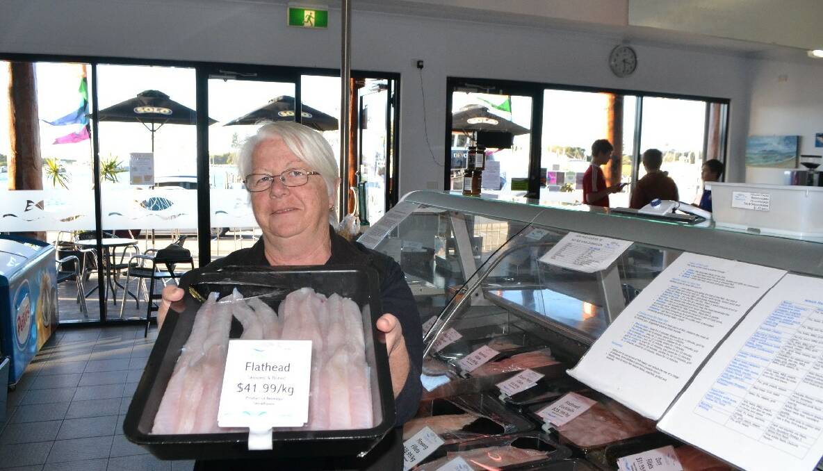 FRESH IS BEST: Blue Wave Seafood’s Rosemary Hamilton with flathead caught by the fishing vessel Shoalhaven. 