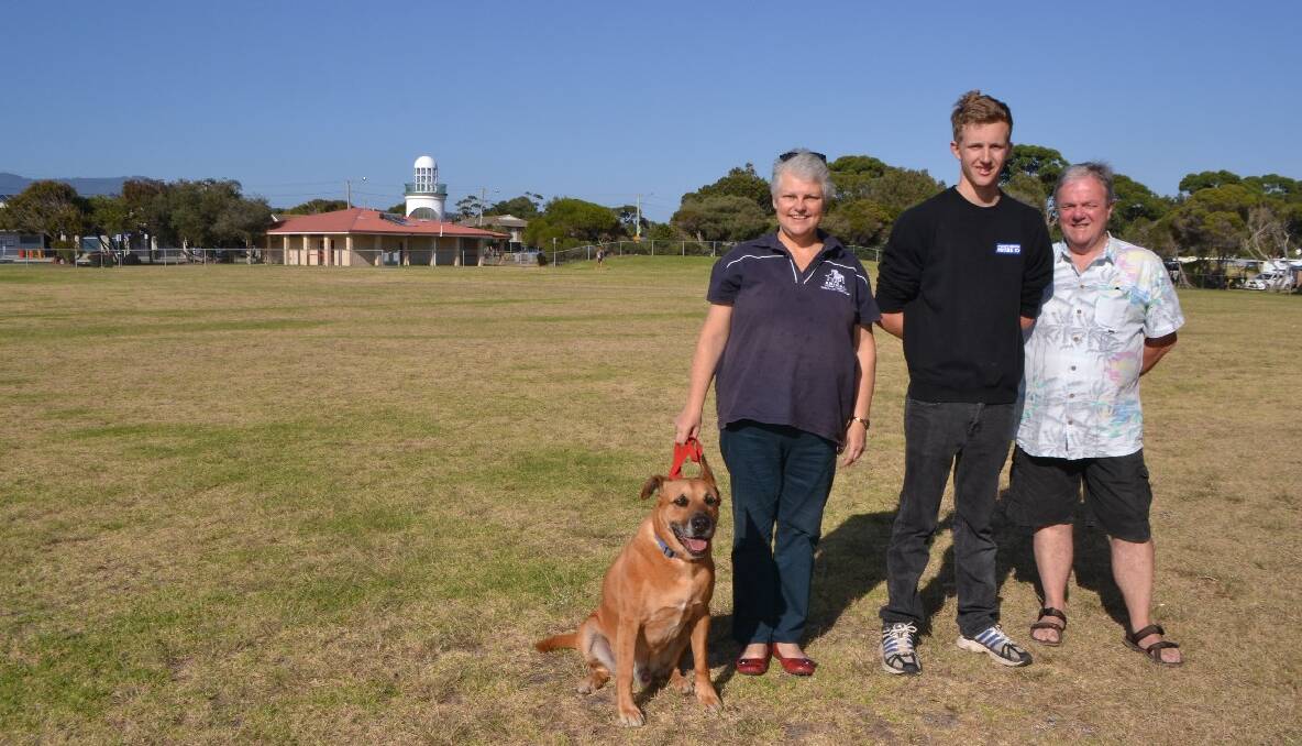 ON THE OVAL: Meeting on NATA Oval over the weekend are local Animal Welfare League branch representative Daiva Ceicys and her dog Titan, youth committee member Ben Potter and deputy mayor Neil Burnside. 