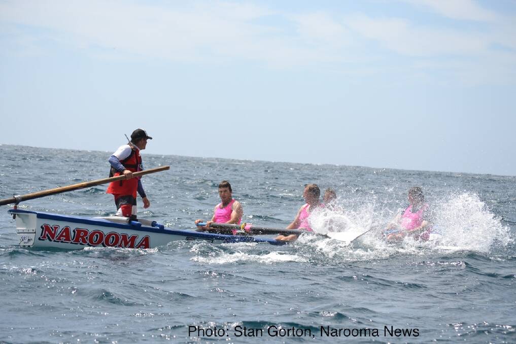 LONG AND HARD: Rowing long and hard off Bermagui are Narooma rowers Rod Patmore, Adam Morris, Unto Holopainen and Stuey Croser. Photo: Stan Gorton, Narooma News