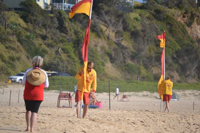 SURF ACTION: Time to set up patrol during the Far South Coast Life Saving Club senior carnival hosted by Narooma SLSC. Photo by Stan Gorton – Narooma News 